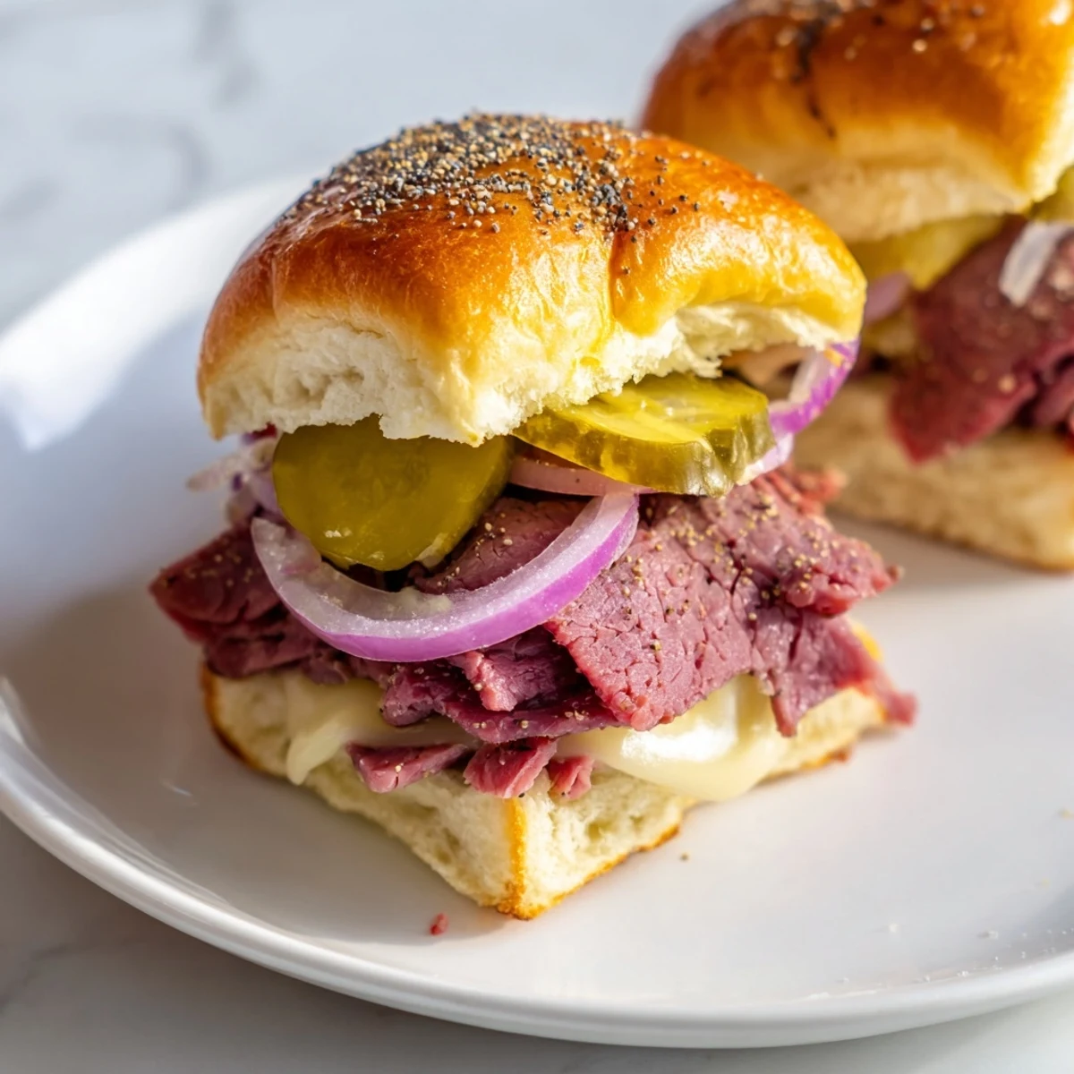 Overhead view of Corned Beef Sliders with Swiss Cheese on a wooden board, ready to be enjoyed at a party.