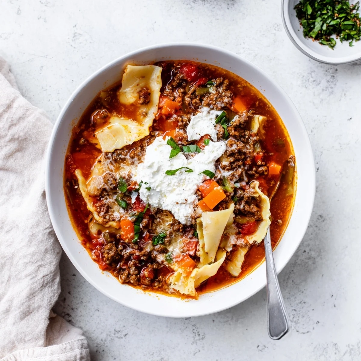 Hearty one-pot Italian lasagna soup with tender pasta noodles in rich tomato broth