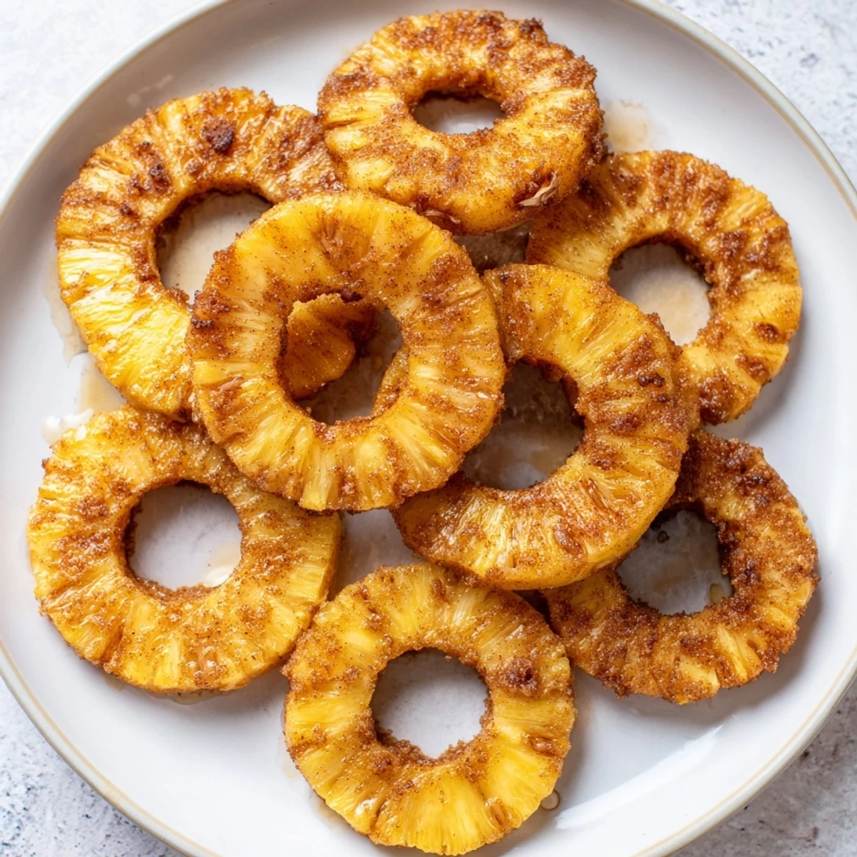 Sweet tropical pineapple rings air fried to perfection with brown sugar coating